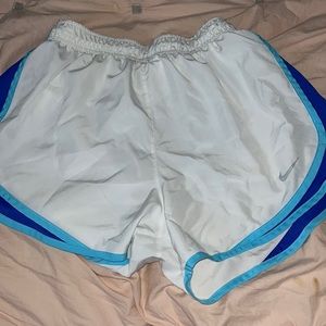 White Nike shorts